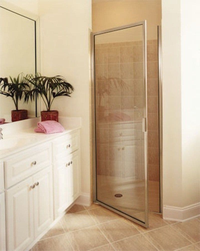 Sliding framed shower enclosure